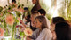 guests making flower arrangements