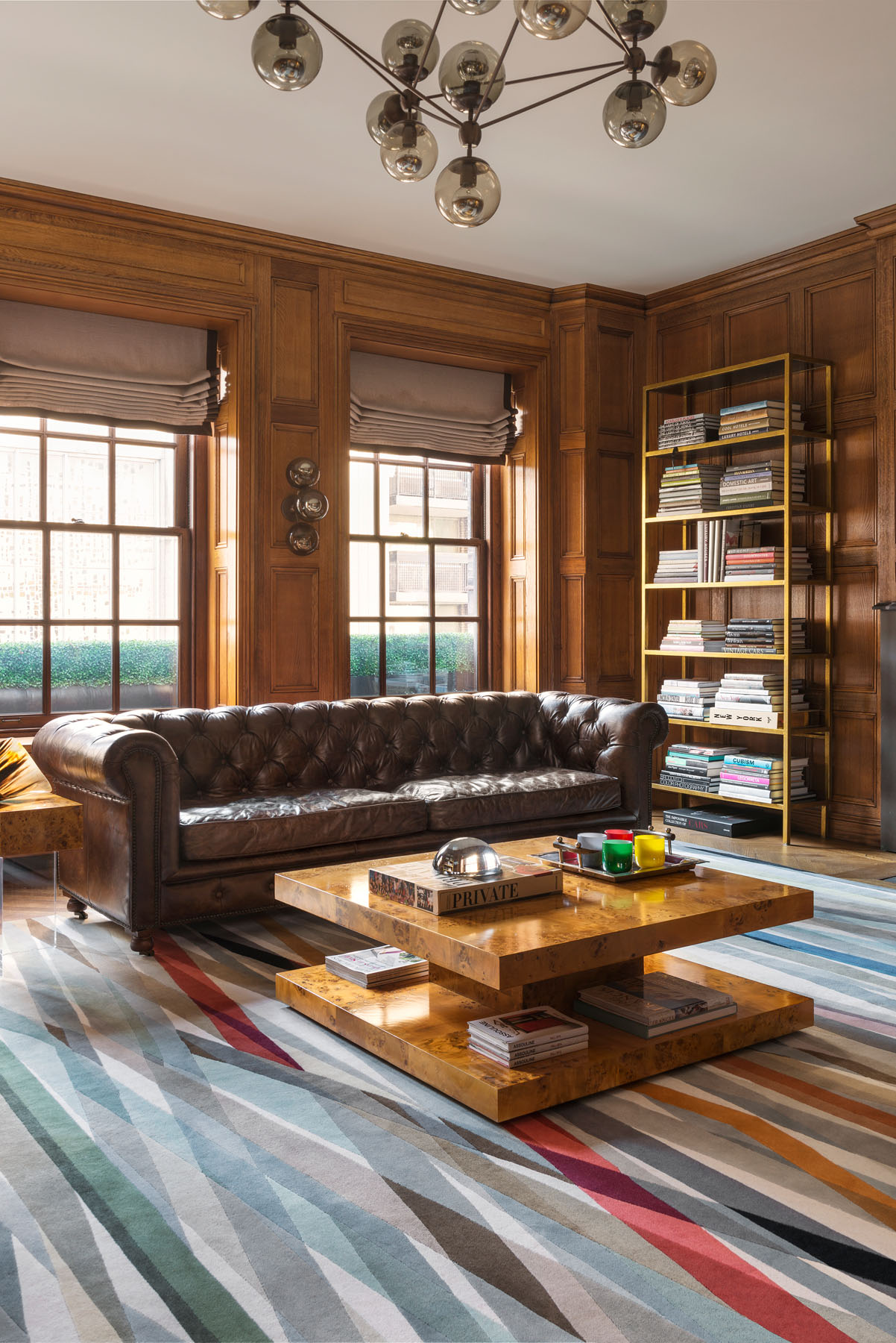 Carnival Round Rug by Paul Smith - rug in a living room