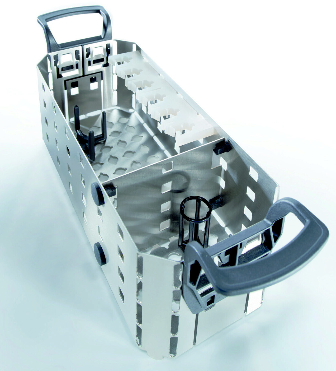 Basket with fixture pins and combs for part and vessel positioning