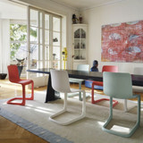 Several Vitra EVO-C Chairs around a dining table