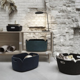 A collection of Muuto Restore baskets and trays