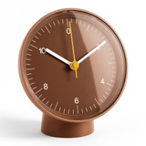 HAY white table clock against a white background