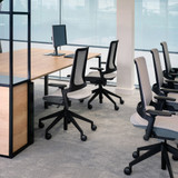 Several Orangebox Kirn Office Chairs in an office