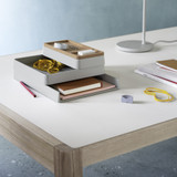 A close up of the Muuto Workshop Desk with items on the top