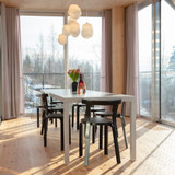Artek Chair 68 black lacquered around a table Artek Chair 68 black lacquered around a table