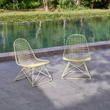 Vitra Eames Wire Chairs LKR by a pond