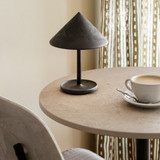 Mater Terra Portable Lamp in Coffee Waste Black on a table Mater Terra Portable Lamp in Coffee Waste Black on a table