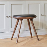 Mater Low Stool next to wooden cupboards Mater Low Stool next to wooden cupboards