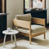 HAY Bella Side Table next to a lounge chair