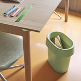 Muuto Reduce Paper Bin under a desk