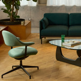 Vitra Mynt Soft Chair next to a coffee table