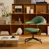 Vitra Mynt Soft Chair by a bookcase