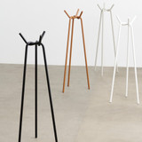 A group of HAY Knit Coat Stands in multiple colours against a neutral background