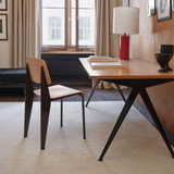 A Vitra Standard Chair next to a wooden desk