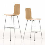 The two heights of the Vitra HAL RE Ply Stool in Natural Oak against a white background