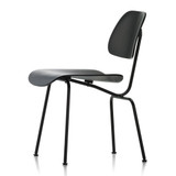 Vitra Eames DCM chair in Black Ash against a white background