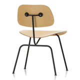 Vitra Eames DCM chair in Natural Ash against a white background
