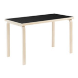 Artek Aalto Table Rectangular in Birch with black linoleum top against a white background