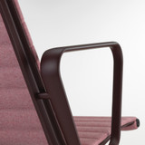 A close up of the Vitra Eames Aluminium Group EA 124 Lounge Chair in Pale Rose