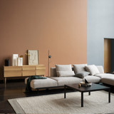 Muuto Reflect Sideboard behind a sofa