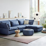 Vitra Akari Light Sculpture UF3-Q next to a sofa