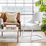 Humanscale Trea Chair next to a sofa