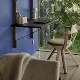 Artek Rival Chair next to a desk