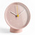 HAY white table clock against a white background