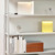 HAY table clock on a shelf