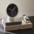 HAY table clock on a shelf