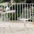 Vitra Eames DKL Wire Chairs on a patio