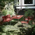 Mater Ocean Outdoor Bench in a garden Mater Ocean Outdoor Bench in a garden