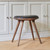 Mater Low Stool next to wooden cupboards Mater Low Stool next to wooden cupboards