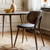 Mater The Dining Chair by a table