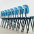 A row of HAY Revolt Chairs