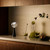 Tom Dixon Melt Portable Light on a shelf