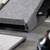A person using a grey Bakker Ekhuizen Ergo-Top 320 Circular Laptop Stand