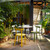 Various coloured Vitra APC Chair on a patio