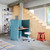 Vitra Rookie Office Chair in grey next to a work booth