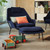 Vitra Slow Chair Fabric in Dark Blue in a living room