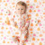 Ruffle Back Zipper Footie - Pink Pumpkins