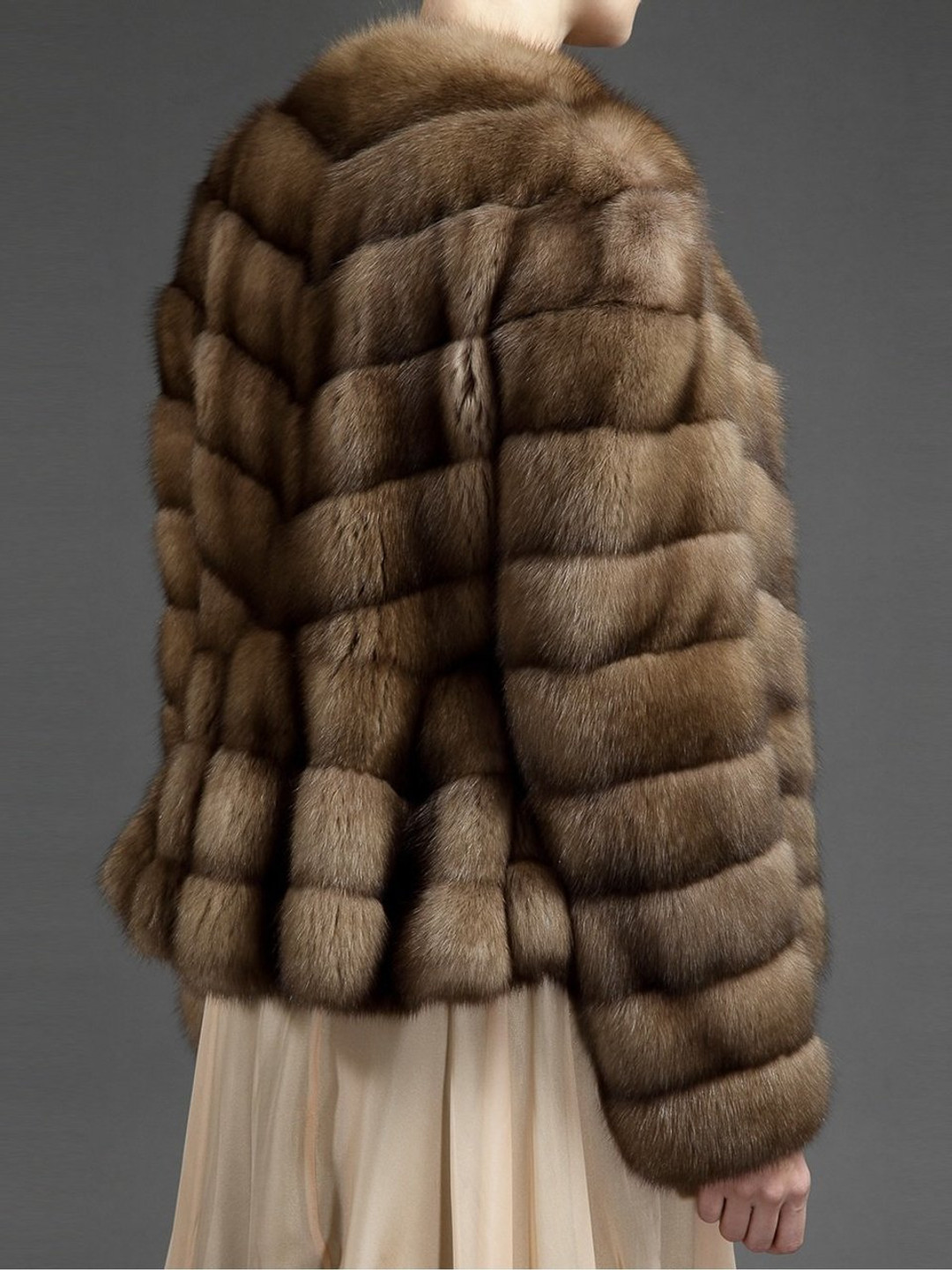 golden russian sable fur coat diagonal stitching and fit in waist rear profile view on model