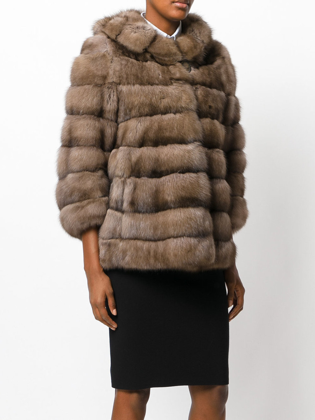 golden russian sable fur coat with hood profile view on model with black skirt