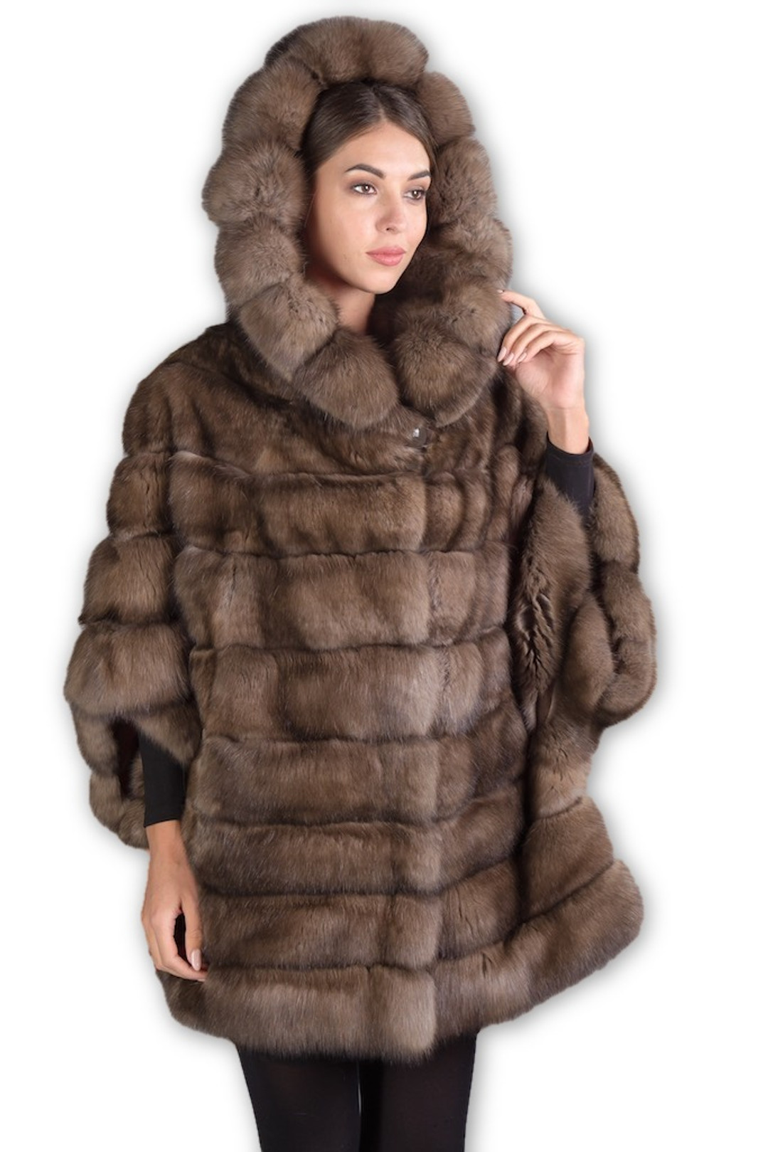 close body view of  model wearing a russian sable fur coat with hood on close body view of  model wearing a russian sable fur coat with hood on