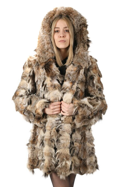 hooded lynx fur coat , mid hip length , made lynx pieces , hood trimmed with canadian lynx , worn by blond model , matching with mini black dress and black leather low cut army boots