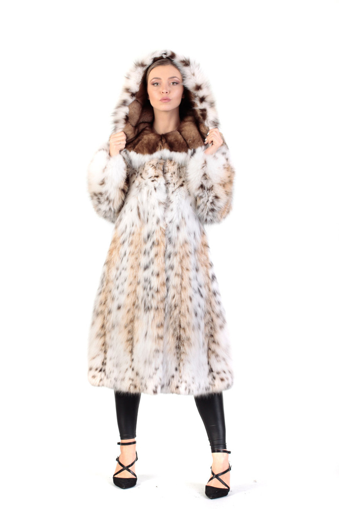 hooded lynx fur coat with hood and sable fur lining , tapered waist and wide bottom sweep hooded lynx fur coat with hood and sable fur lining , tapered waist and wide bottom sweep
