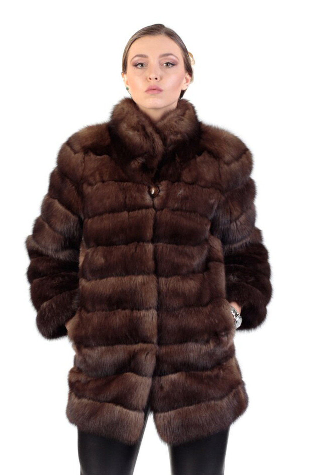 brown sbale fur coat mid hip length , with pelts stiched horizontally , rounded collar on blonde model wearing leather pants