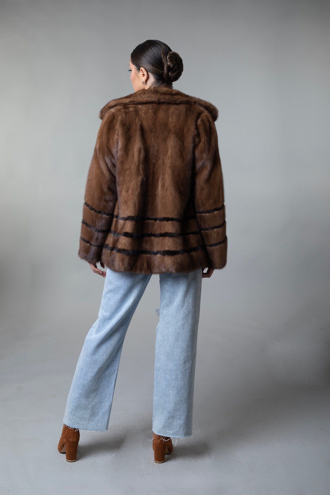 Brown Mink  Fur Coat Stand Up Collar Striped Hip Length on  model rear view Brown Mink  Fur Coat Stand Up Collar Striped Hip Length on  model rear view