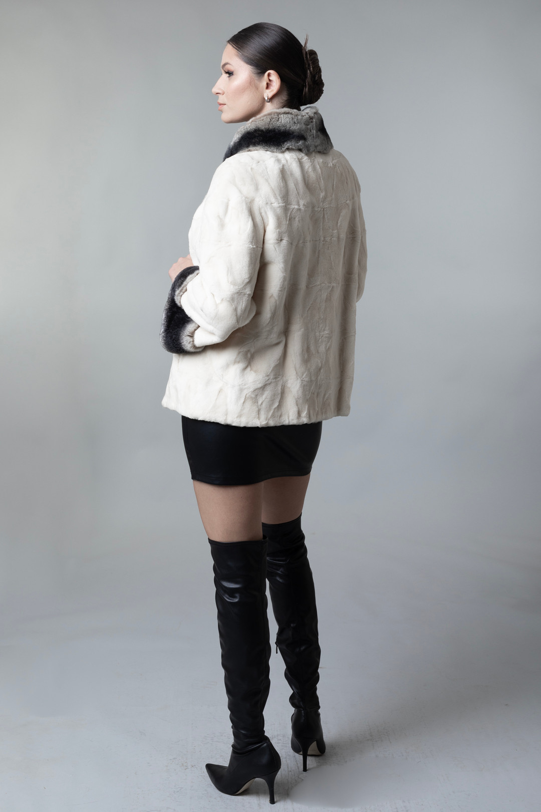 short White mink fur jacket  rex chinchilla collar and cuffs  on model  side view