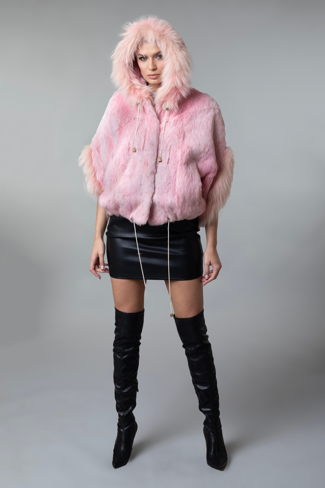 Pink Fu Cape Hooded Fox Trim Drawstrings on model hood on Pink Fu Cape Hooded Fox Trim Drawstrings on model hood on